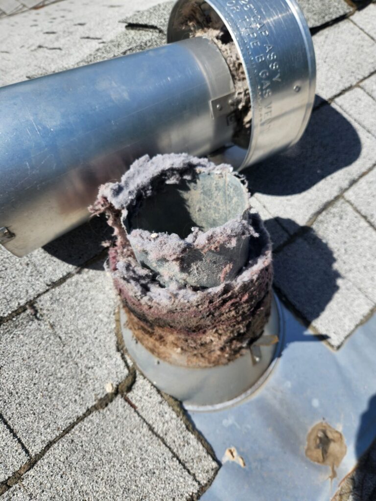 dryer roof vent lint clog